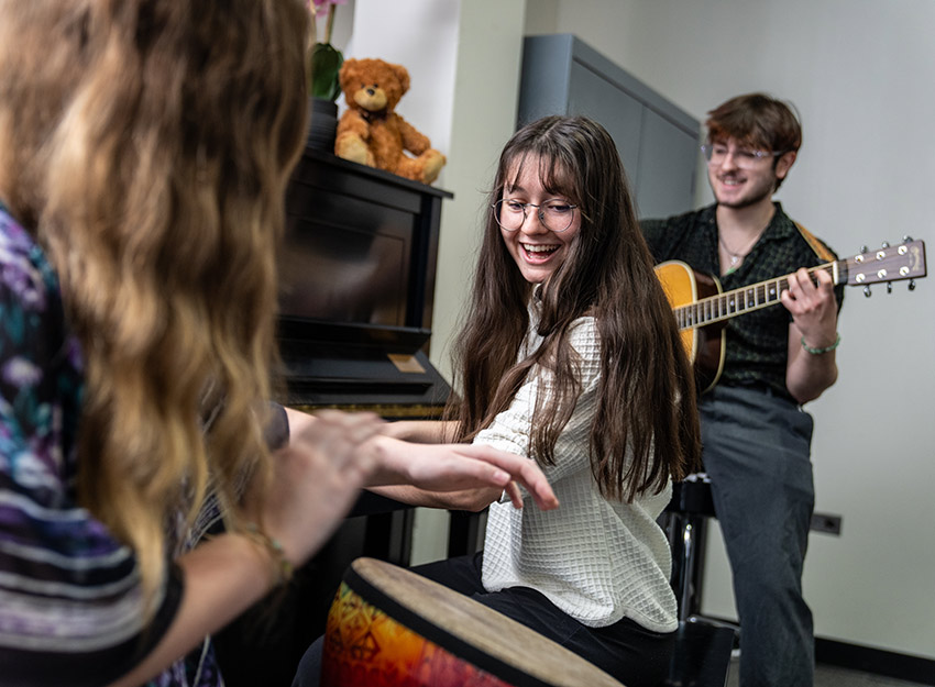 Converse students practice instruments in class.