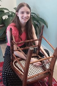 Kristin Jurewicz demostrates chair caning