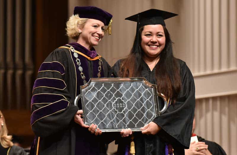 Brenna Bylar receives the Elford C. Morgan award from President Betsy Fleming
