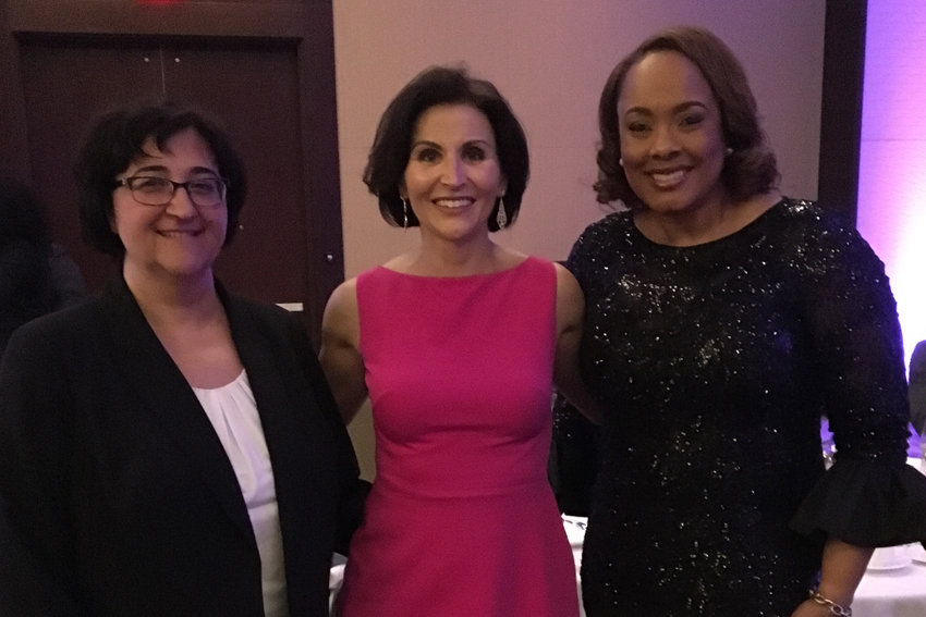 Dr. Neval Erturk (left), President Krista Newkirk (center), and alumna Candy Moore (right) at the Minority Access National Role Model Awards Gala