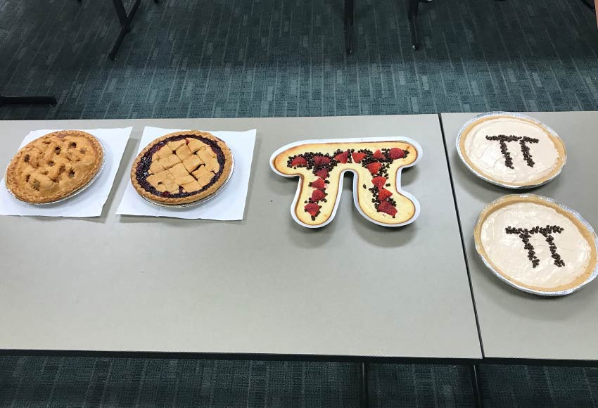 Math department celebrates Pi Day with pizza pie and dessert pie