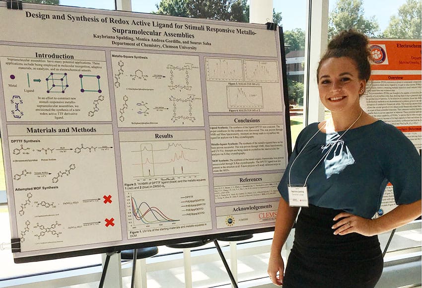 Kaybriana Spalding with research poster