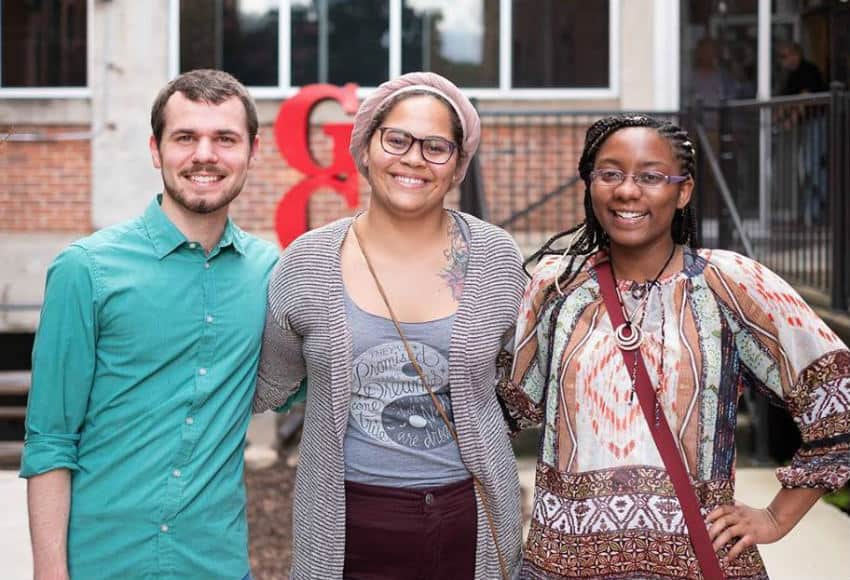 Art Graduate Angel Jenkins (center)