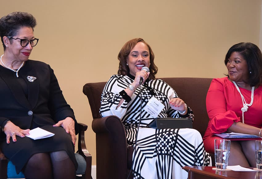 Candy Moore (center) speaks at Celebrating Courage