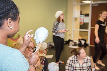 Students in puppet class