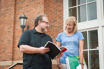 Professor Mulkey speaks with an MFA student