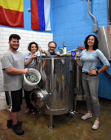 MFA faculty and students at brewery