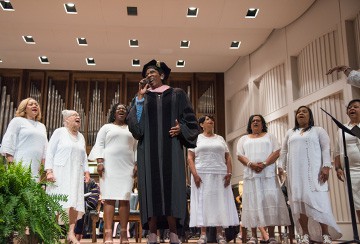 Carla Harris performs with the Converse Alumnae Gospel Choir