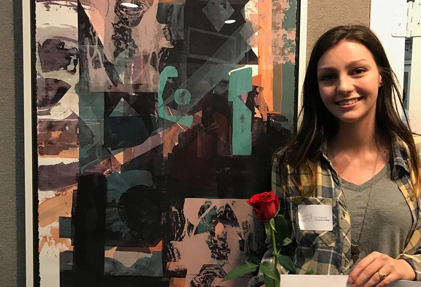 Photo of Cynthia Hall with art work