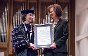 Photo of Melissa Johnson receiving an award