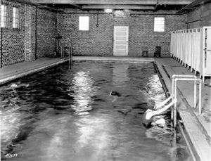 Black and white photo of old Converse pool