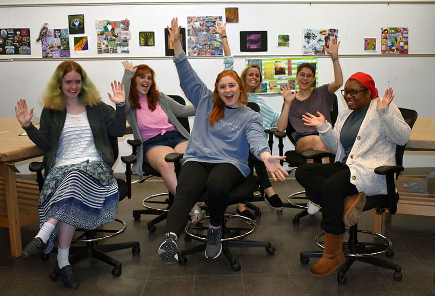 Students celebrate their new chairs