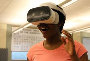 A student wears new VR goggles