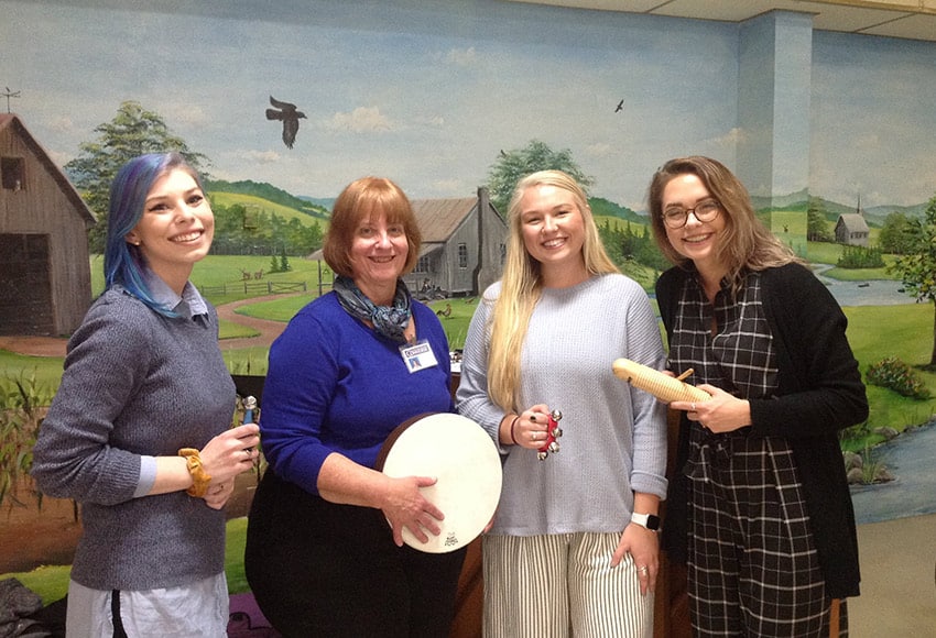 Music therapy majors volunteer with nursing home choir