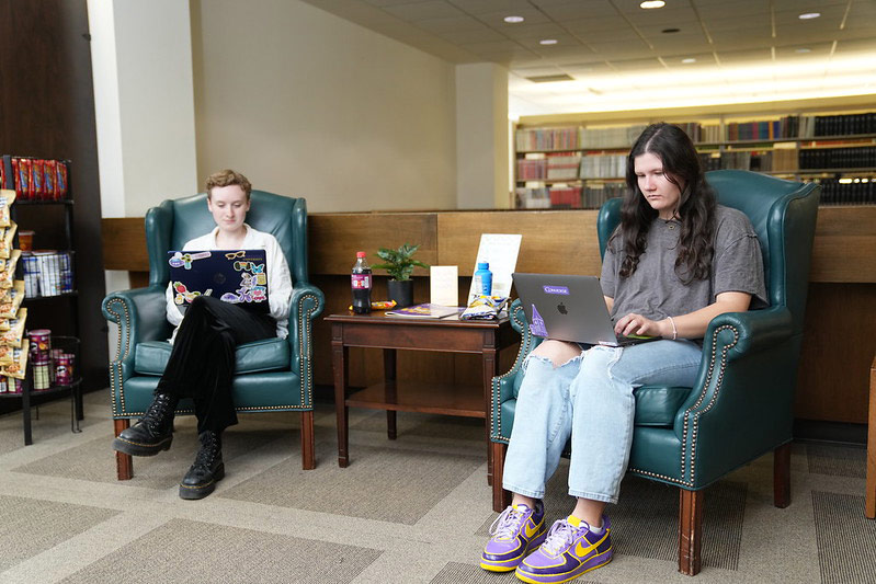 Students study in the library cafe