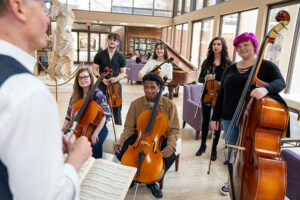 Music students take a class in Converse's Blackman Hall.