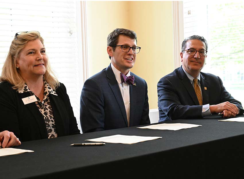 President Boone Hopkins at the official signing for the MAT partnership