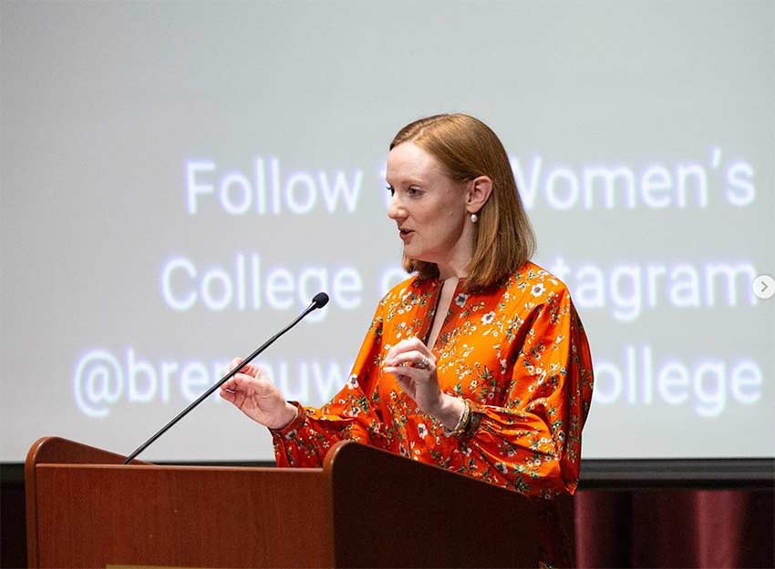Chandra Hopkins speaks on stage at the women's leadership event