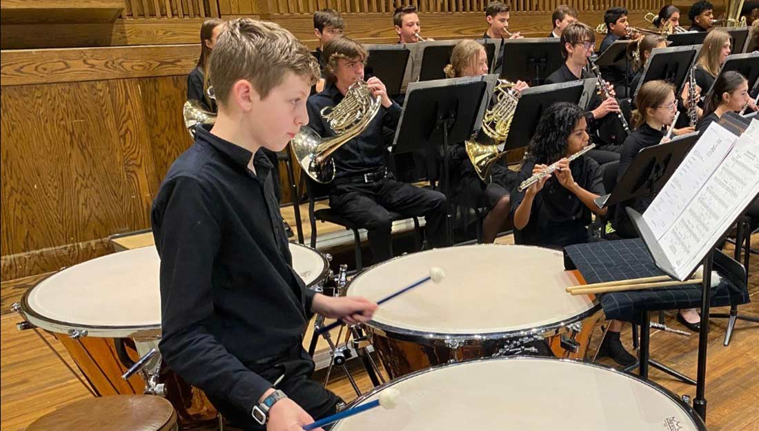 A member of the Spartanburg Youth Orchestra plays the drums