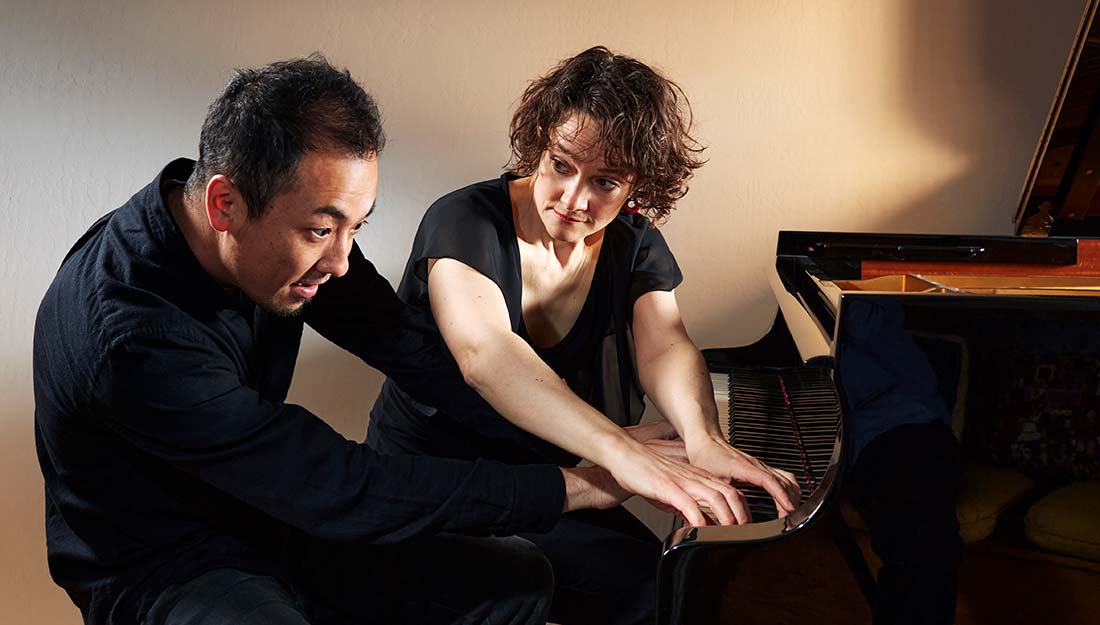 The members of the band ZOFO play the piano