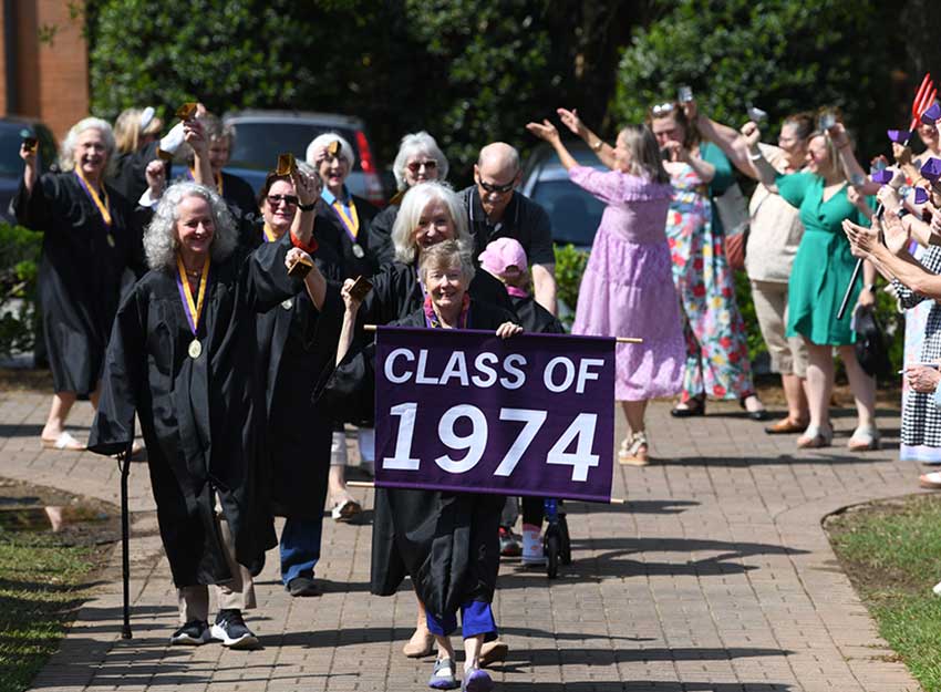 The Class of 1974 processes across the Converse campus