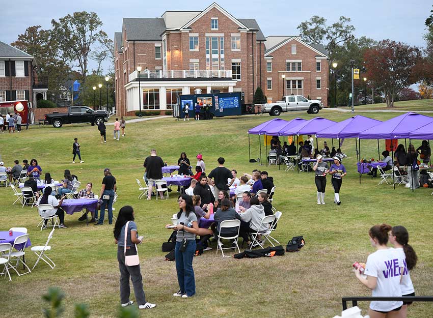 Converse students, staff, faculty and their families fill the campus quad while attending Homecoming events.