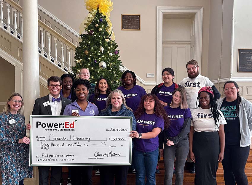 A group of Converse's first-generation students celebrate a $50,000 Grant from Power:Ed focused on career readiness. Campus and Power:Ed leaders include, from left, Converse Assistant Vice President of Advancement Services Rebecca Parrish, President Dr. Boone Hopkins, Director of First Generation Programs and Student Success Initiatives Daphnie Glenn, and Power:Ed Executive Director Claire Gibbons.