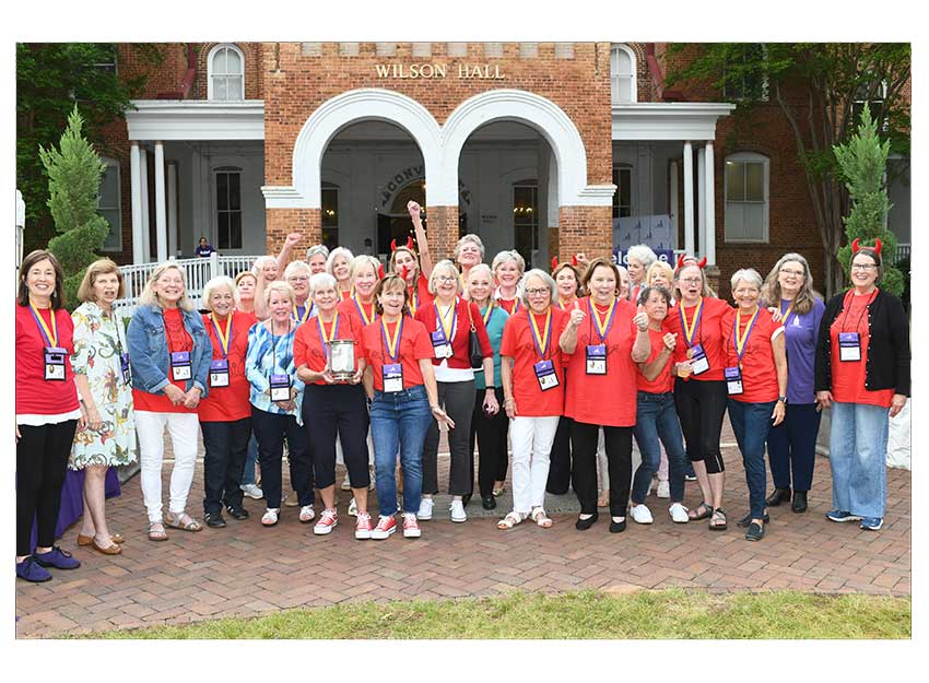 Group photo of the Converse class of 1975 in their matching t-shirts
