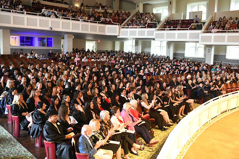 Group photo of the interior of Twichell Auditorium filled with guests for Founders Day