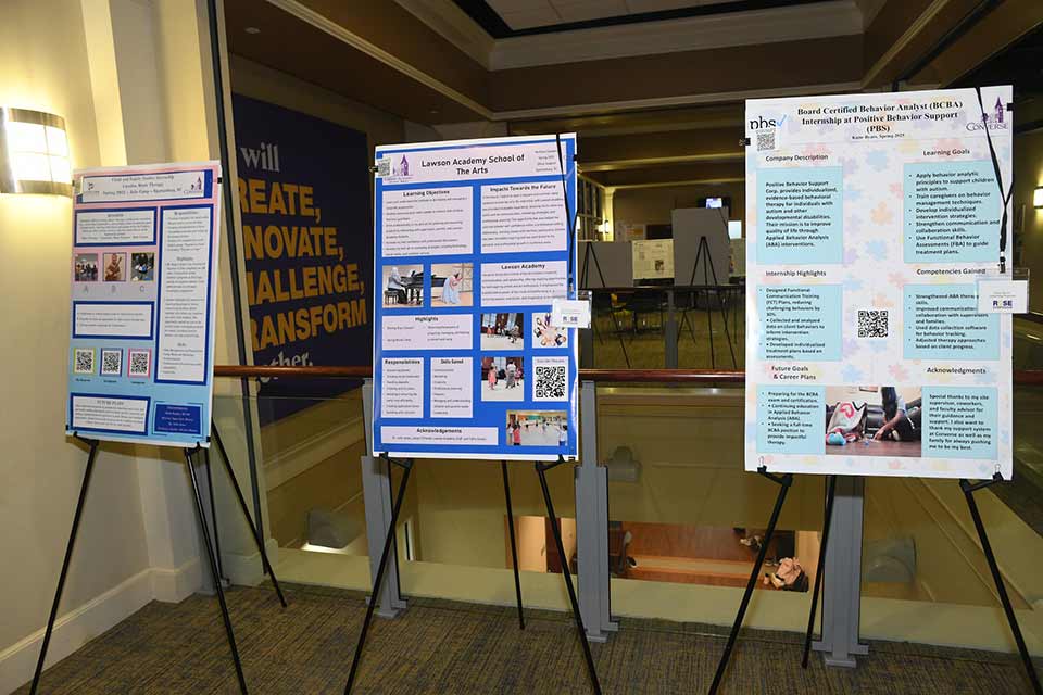 Three posters submitted to the ROSE contest are displayed in Montgomery Student Center