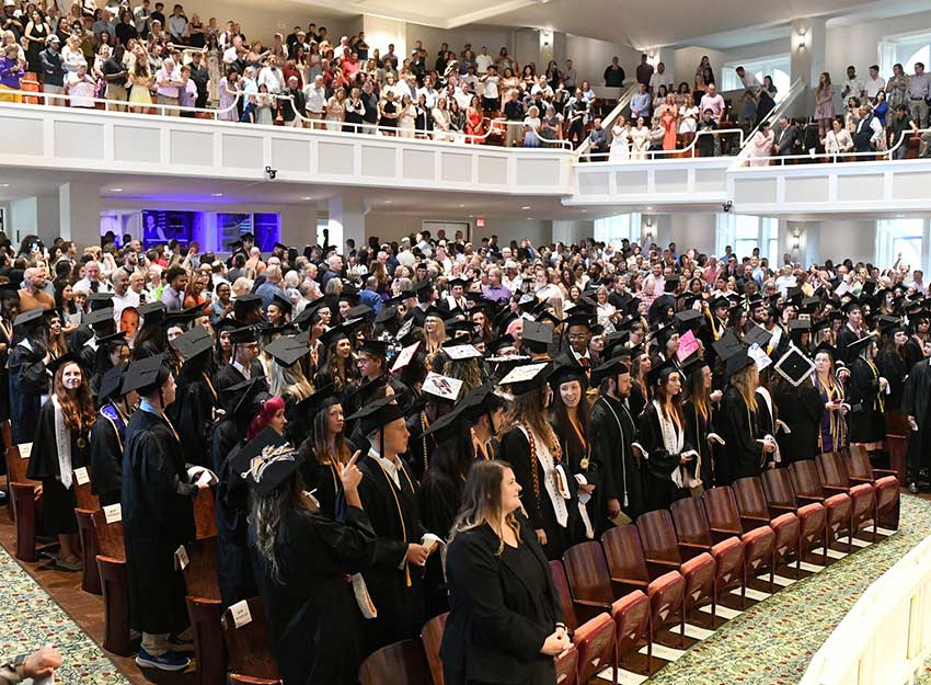 A view of the graduates and crowd inside Twichell Auditorium for 2025 graduation.