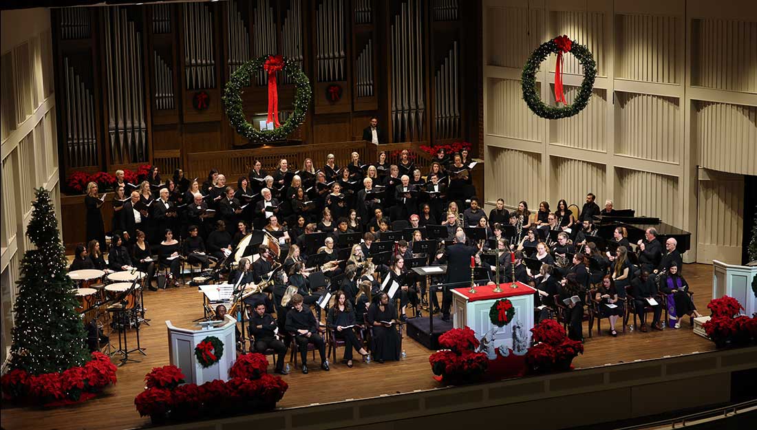 View of the decorated stage during the Festival of Lessons & Carols at Converse.