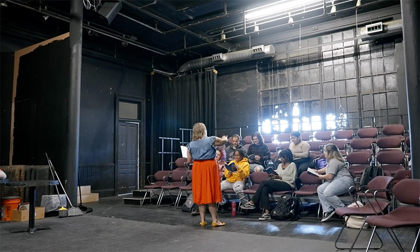 A guest artist speaks to a group of Converse Theatre and Dance students.