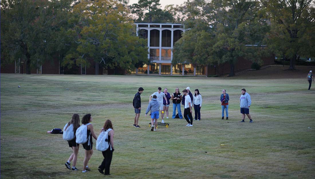 Converse students on the quad on a summer evening.