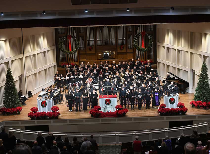 A view of the decorated stage during the 2025 Lessons and Carols performance.