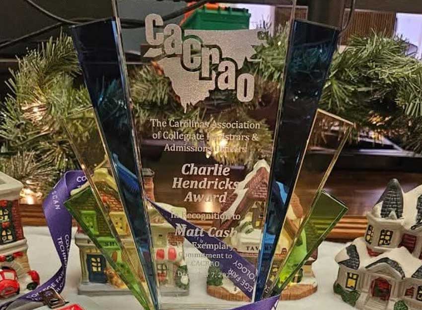 Matt Cash's award sits on a table surrounded by holiday decor.