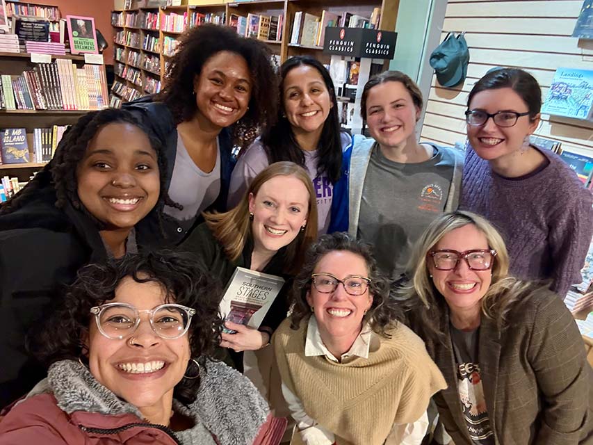 Hopkins stands with Converse colleagues after her book signing at Hub City Bookshop.