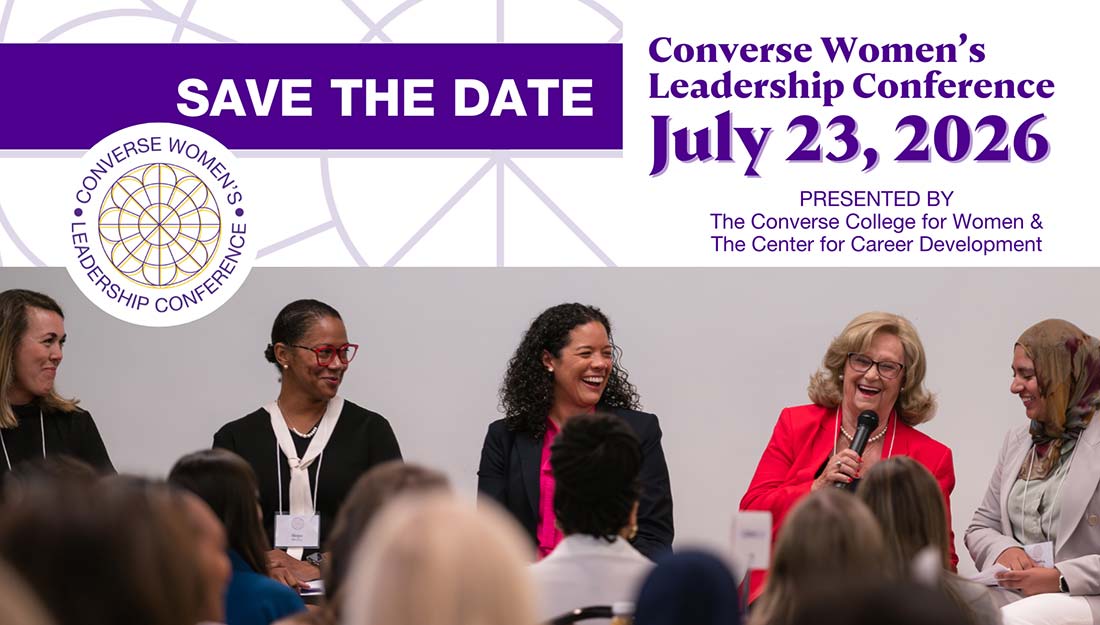 A group of women on stage talking at a Converse leadership conference.