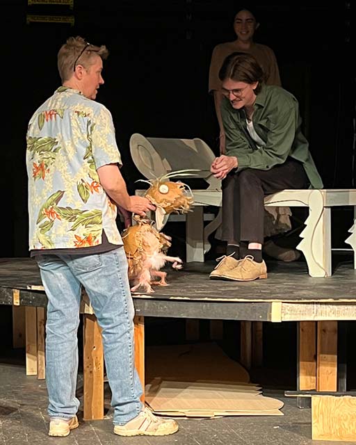 Hanna-Tominaga introduces Converse theatre student Ryan Colvard '25 to a puppet.