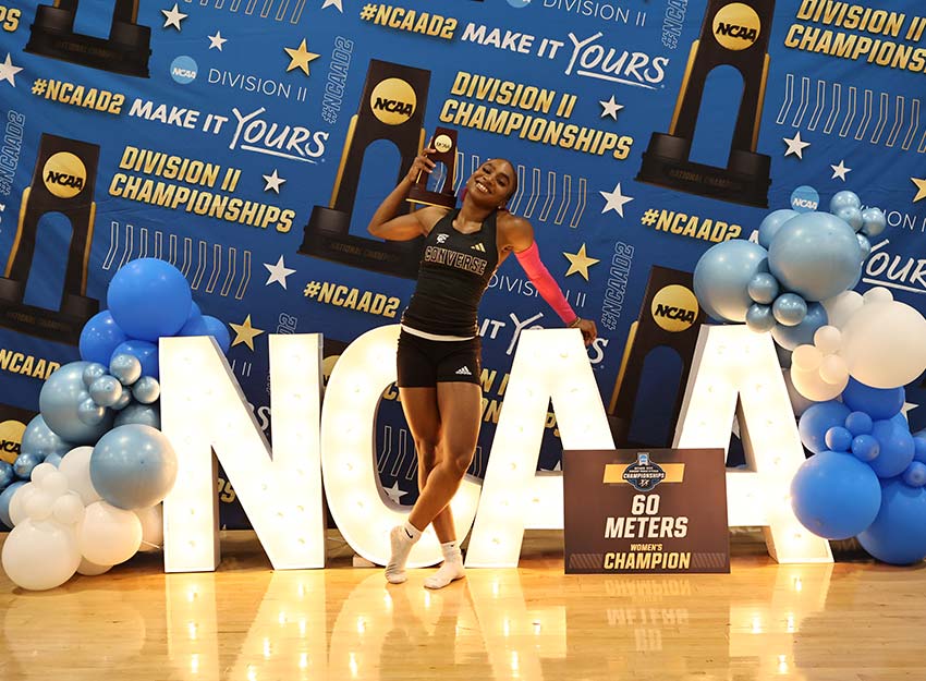 Grace Davis holds her award