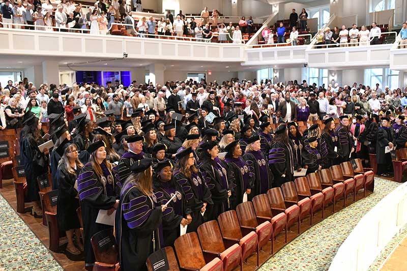 The graduate class of 2026 sits in Twichell Auditorium