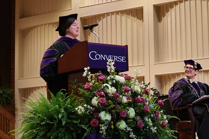 President Hopkins watches as Dr. Medford gives the Commencement speech