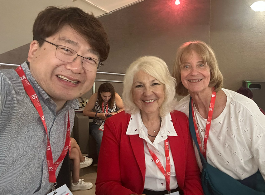 Dr. Shultis stands with colleagues at the event in Italy
