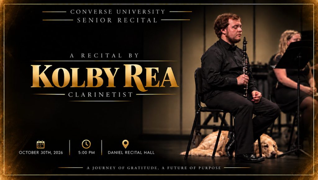 Kolby sits onstage holding a clarinet during a performance