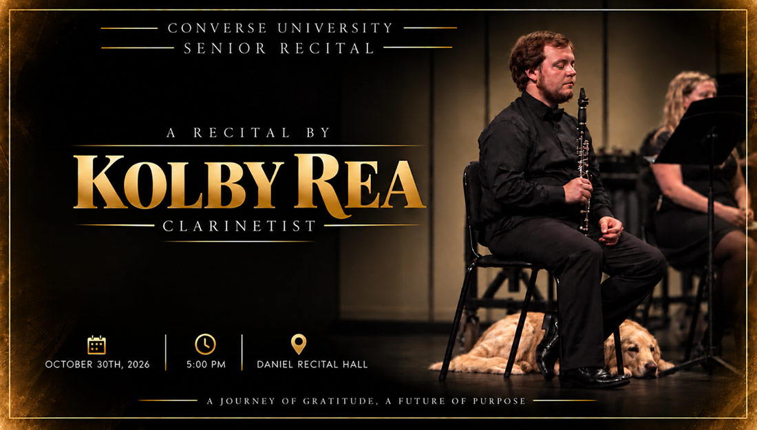 Kolby sits onstage holding a clarinet during a performance