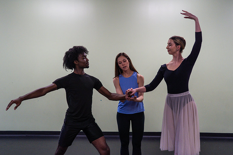 Ron rehearses with another dancer and teacher.